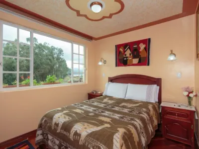 Search and Stay destination Otavalo, Imbabura - Ecuador from AU$ 50. Casa de Luis with lake San Pablo views - Room 1