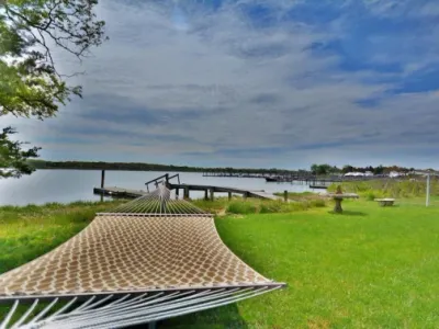 Search and Stay destination Southampton, NY - United States from AU$ 600. Southampton WaterFront Cottage with Dock & Heated Pool